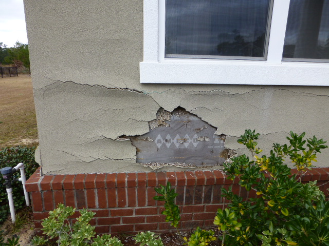 Water damage from a bad Stucco job. 